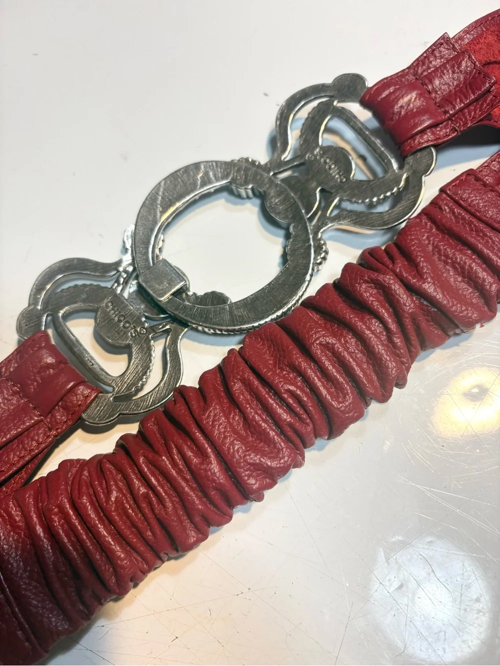 Chico's red leather stretch belt large, ornate silver statement buckle